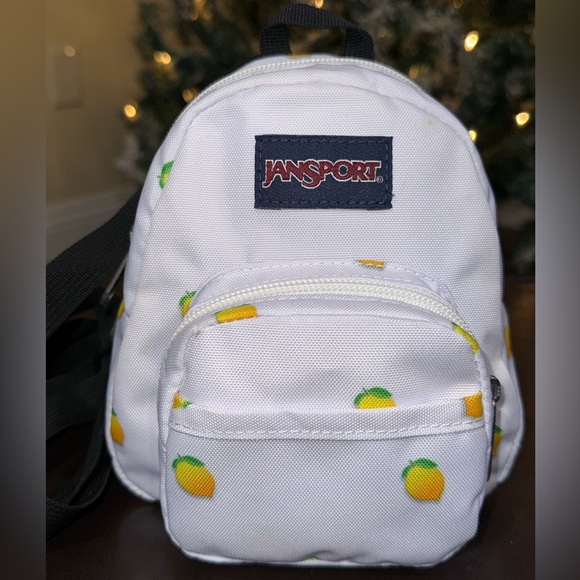 Jansport Handbags - Adorable JanSport Quarter Pint Mini White Convertible Backpack with Lemon Design